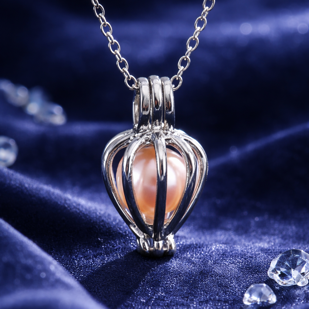 Silver pendant with a heart-shaped design on a blue fabric background